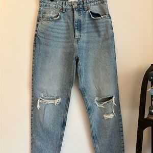 Woman’s Zara Medium Wash Distressed Jeans